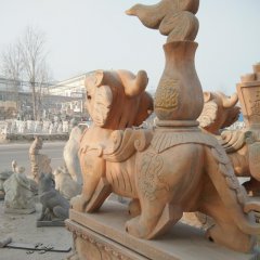 貔貅石雕，晚霞红驮宝神兽石雕