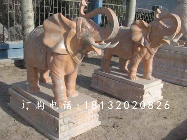象鼻向上大象石雕，晚霞红大象雕塑