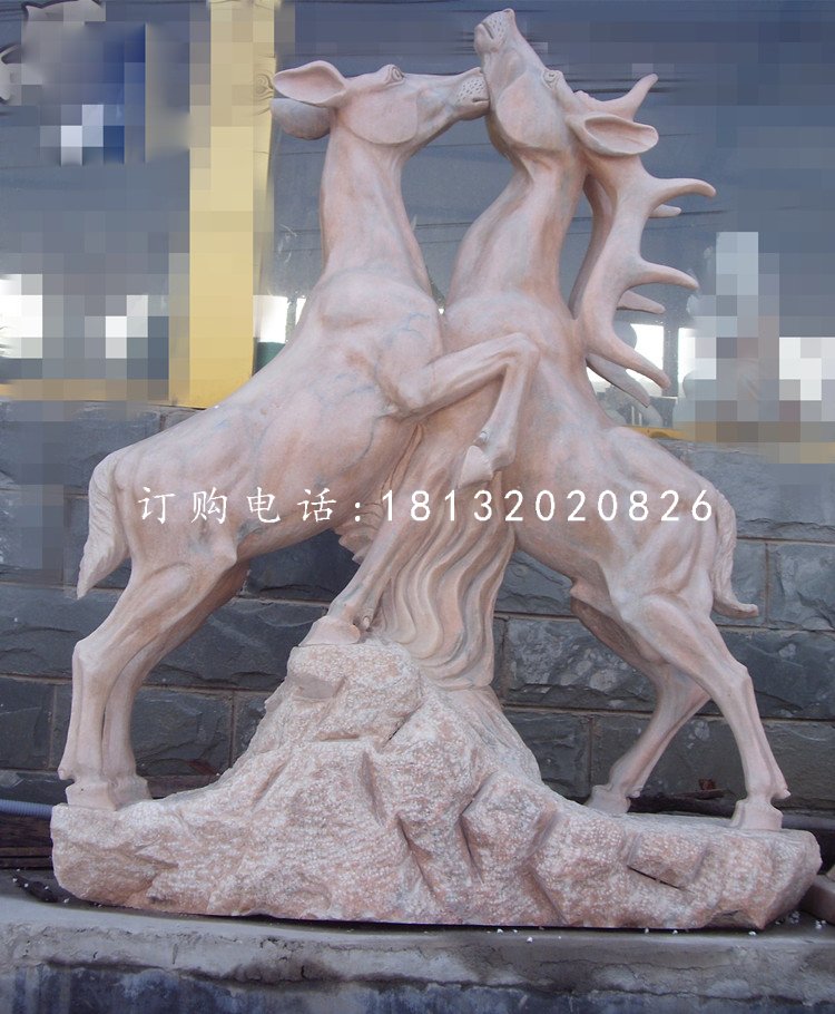 两只鹿石雕，晚霞红动物雕塑
